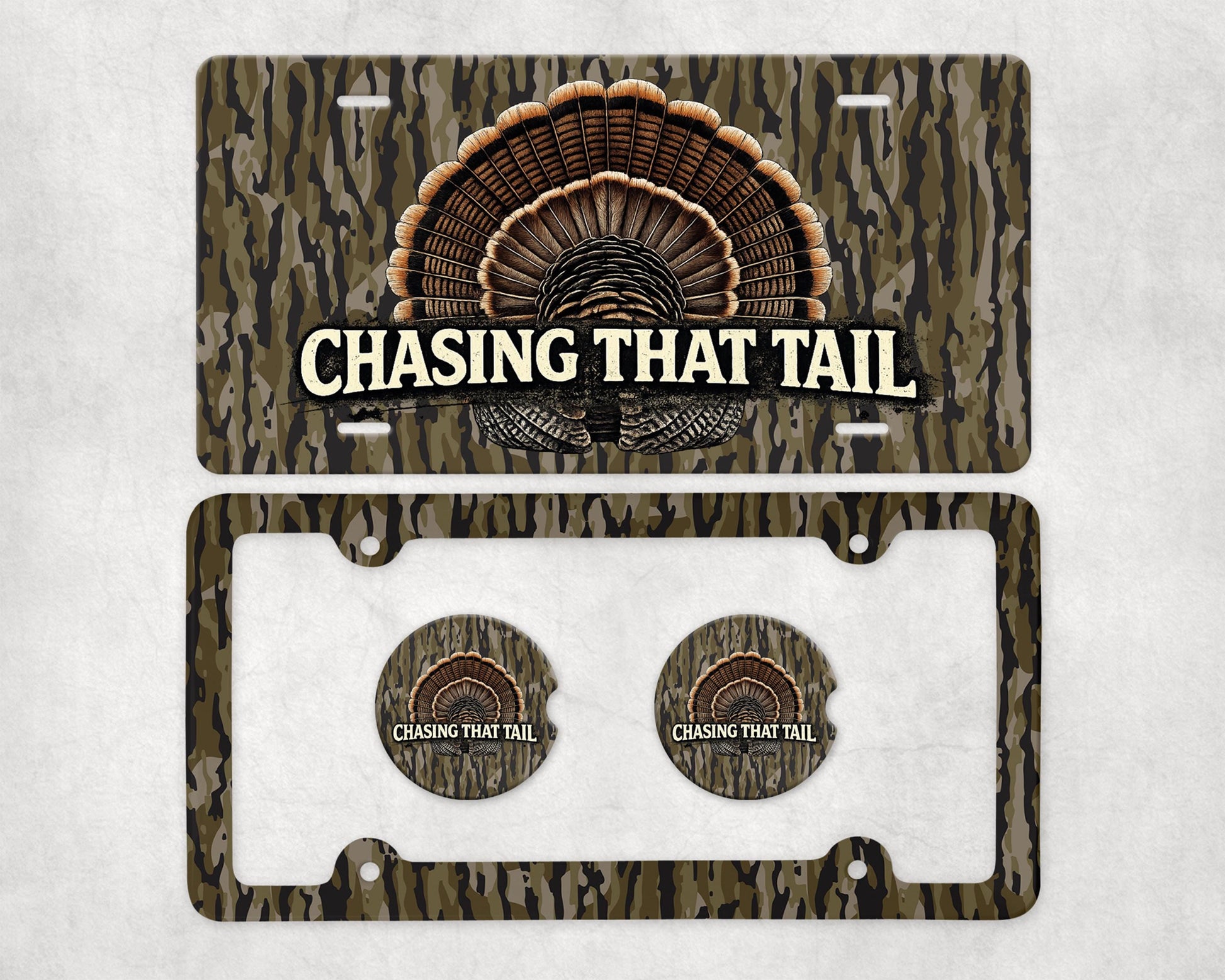May include: A license plate and car accessories set with a camouflage pattern. The license plate features a turkey tail design and the text "CHASING THAT TAIL". The set includes a license plate frame and two matching car coasters.